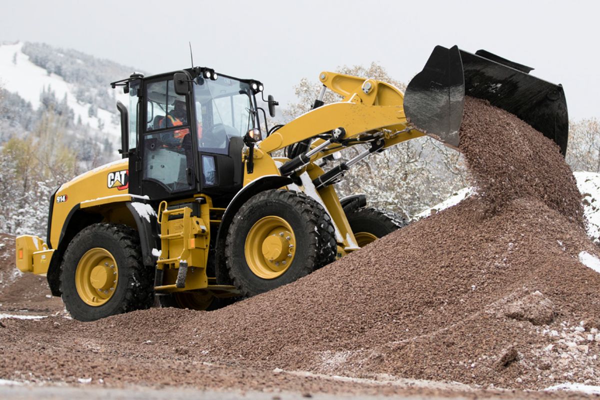 Wheel loader dumping dirt