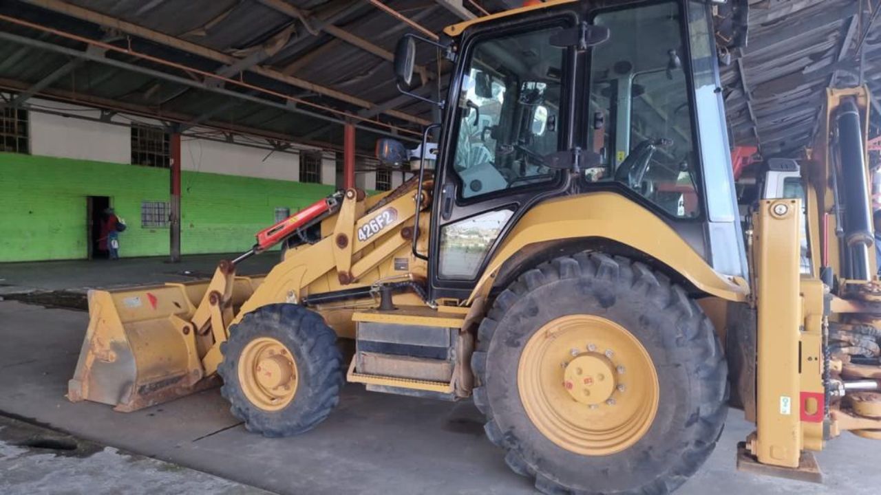 the Cat backhoe loader