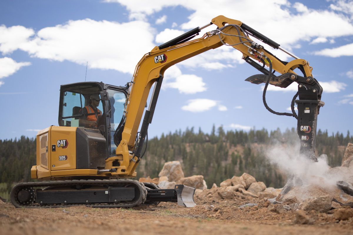 Cat's New Mini Excavator Accepts Skid Steer Attachments