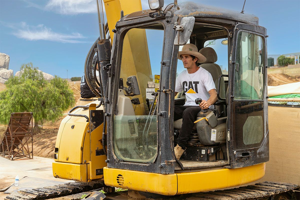 Jarryd operating an excavator