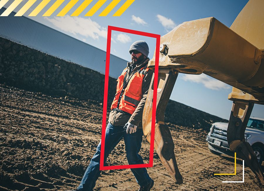 Operator Walking by a Machine