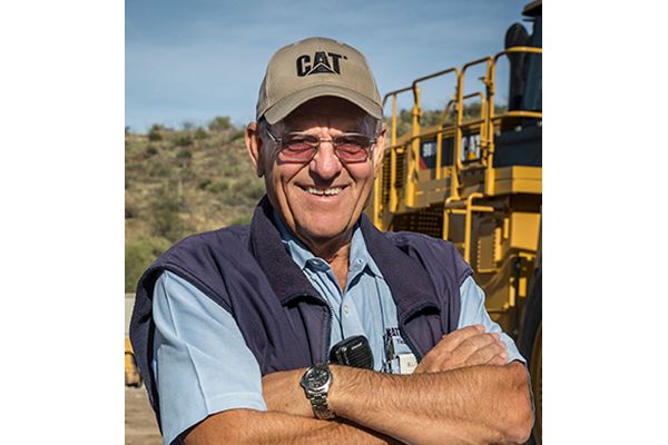 Senior male Cat machine owner/operator