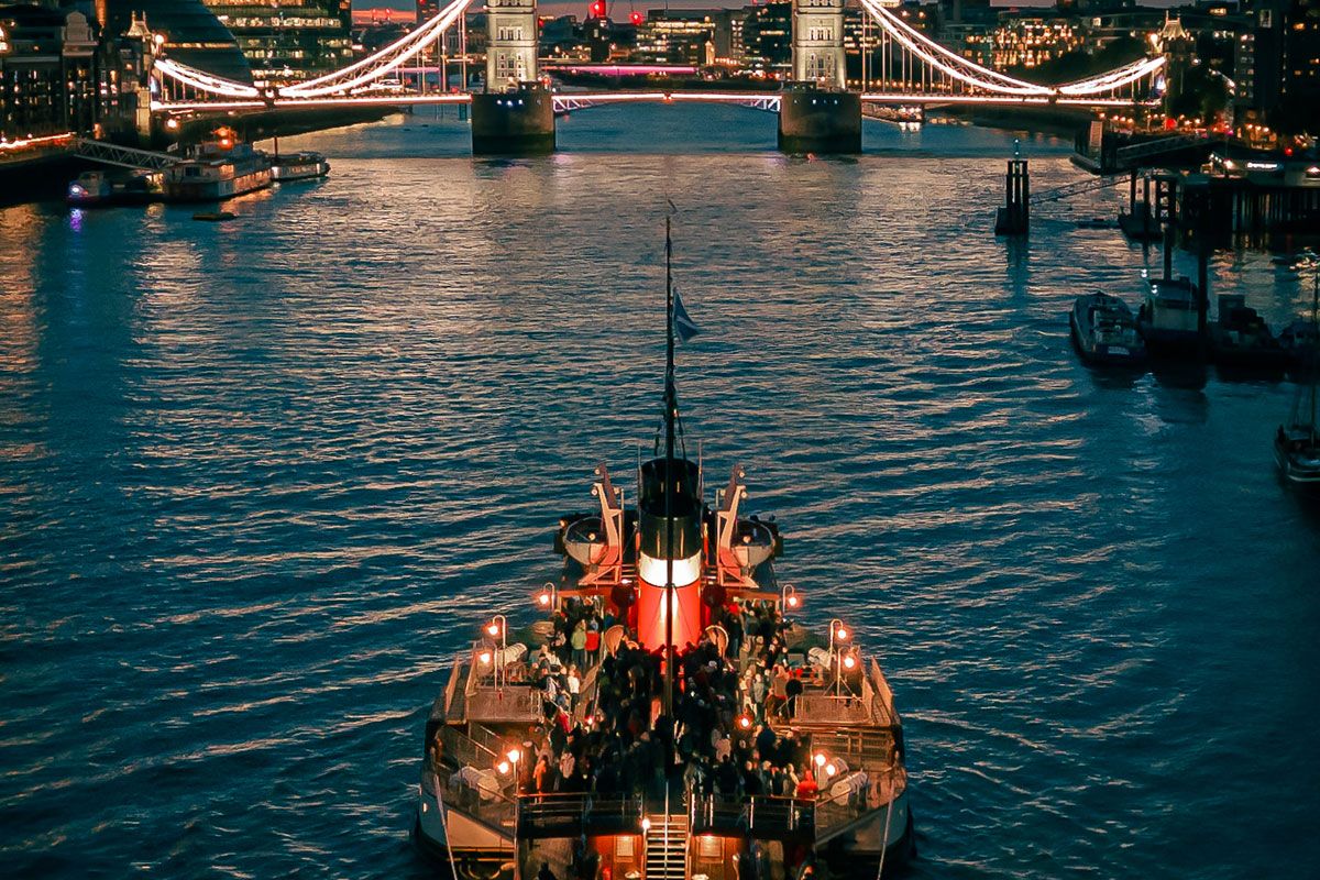 PS Waverley steam boat navigating under a raised draw bridge