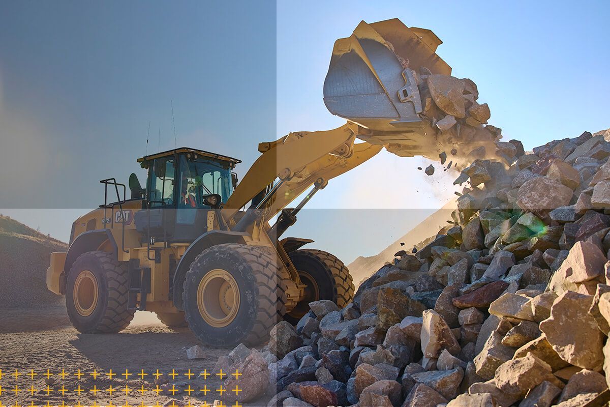 Wheel loader dumping rubble on jobsite