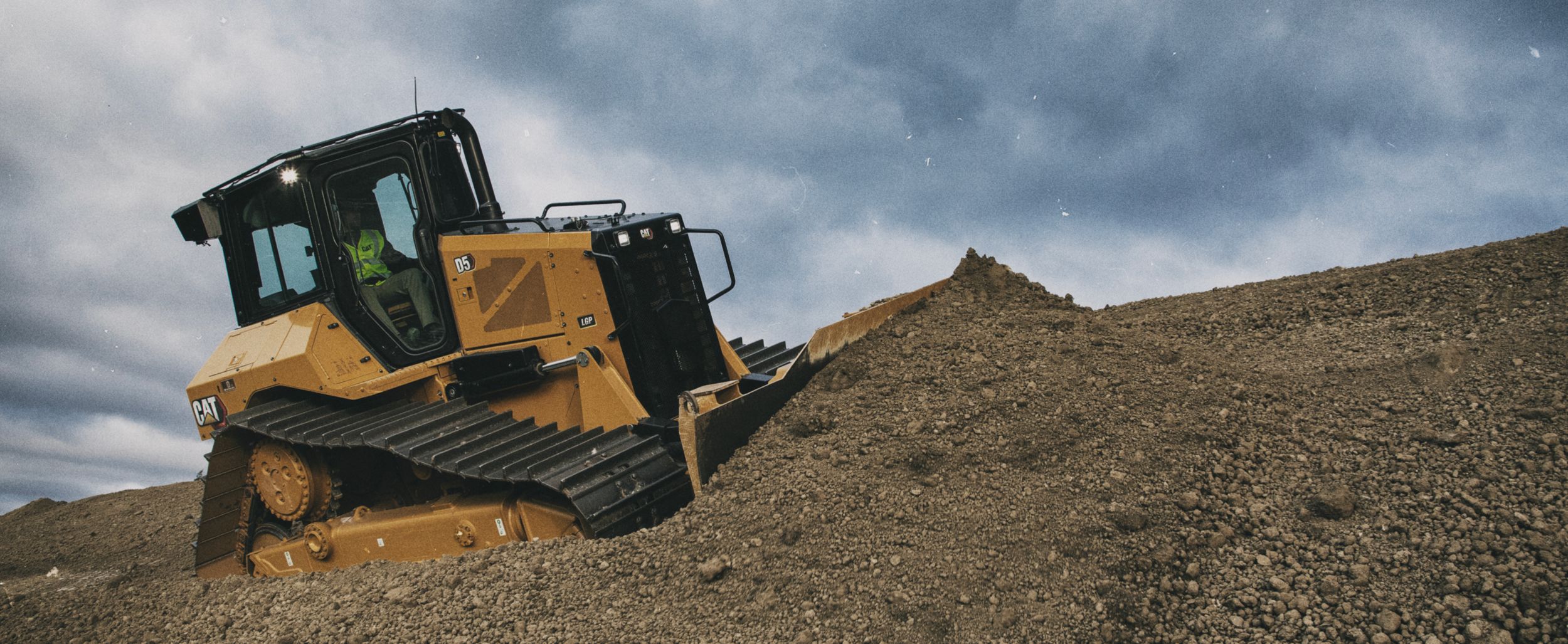 D5 Dozer pushing dirt on a jobsite