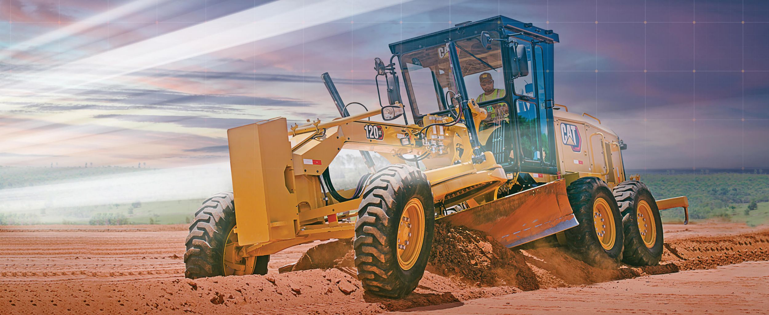 Cat® Motor Grader pushing dirt with graphic rays of sun shining