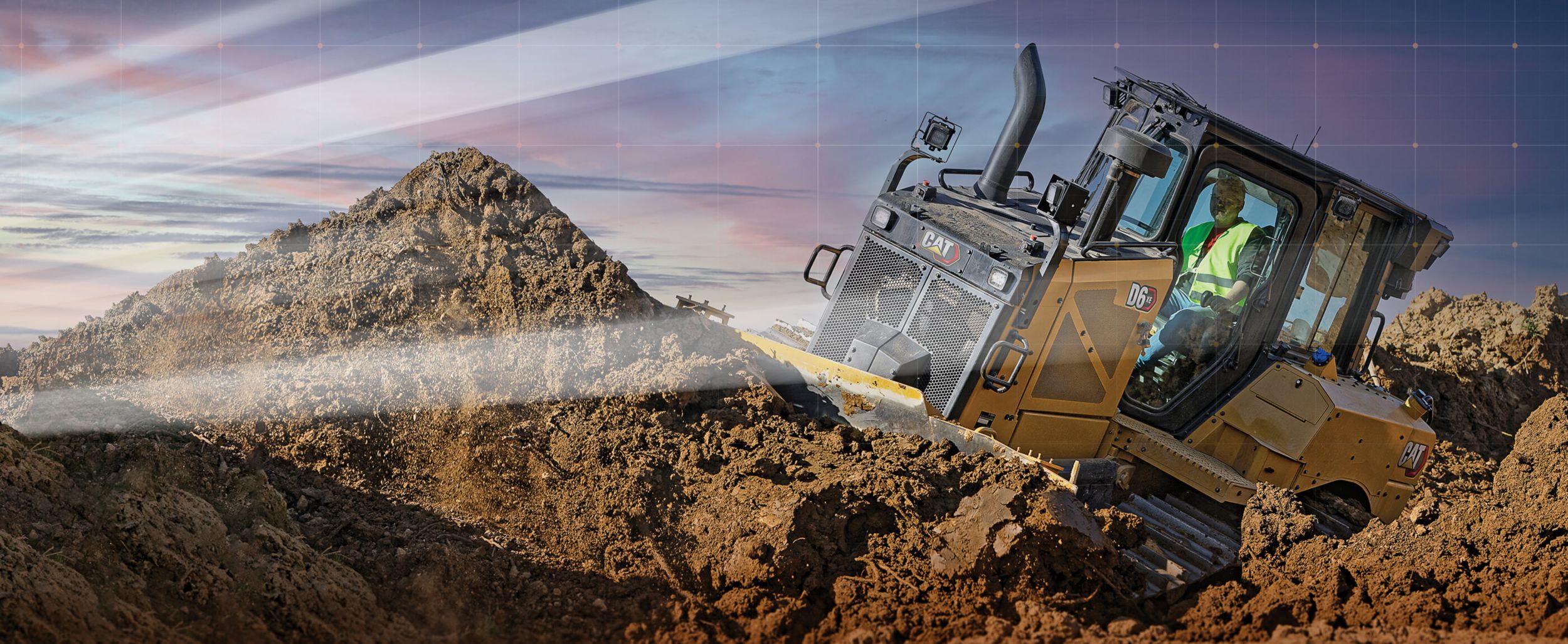 Cat® Dozer pushing dirt with graphic rays of sun shining