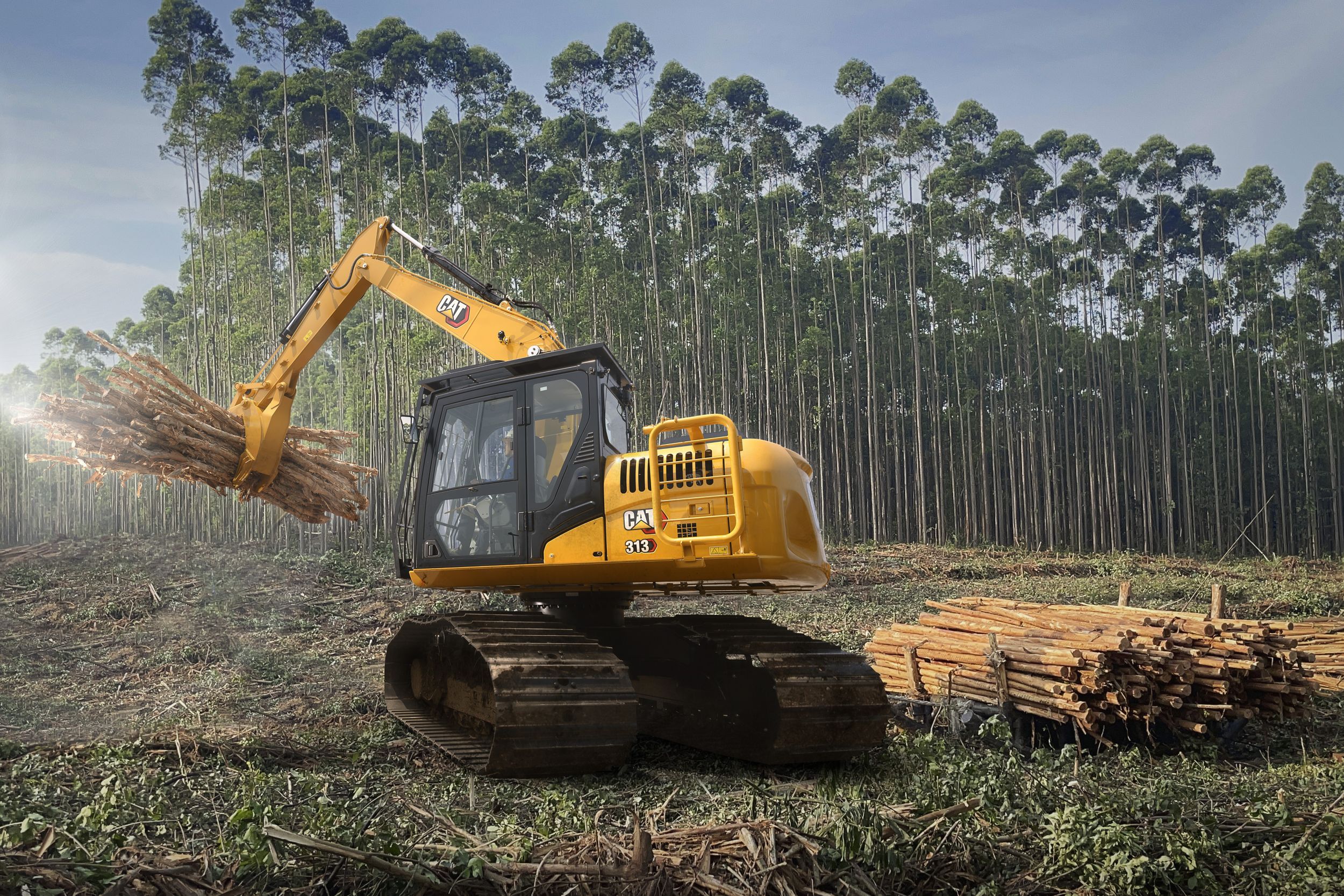 Cat 313 low ground pressure hydraulic trackhoe excavator brings premium power, performance, control, digging, trenching, and heavy lifting capability to your large scale projects.