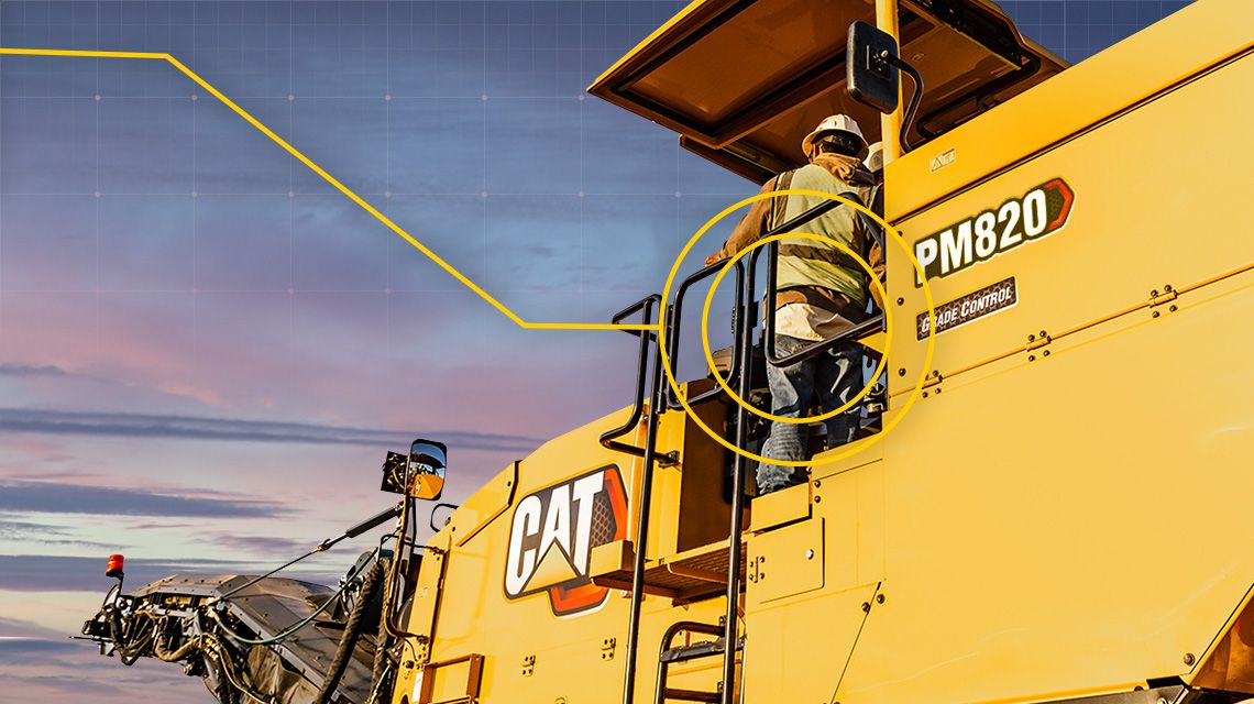 Operator on cold planer with circle graphics