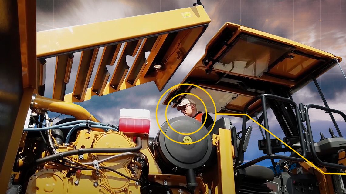 Operator on cold planer with circle graphics