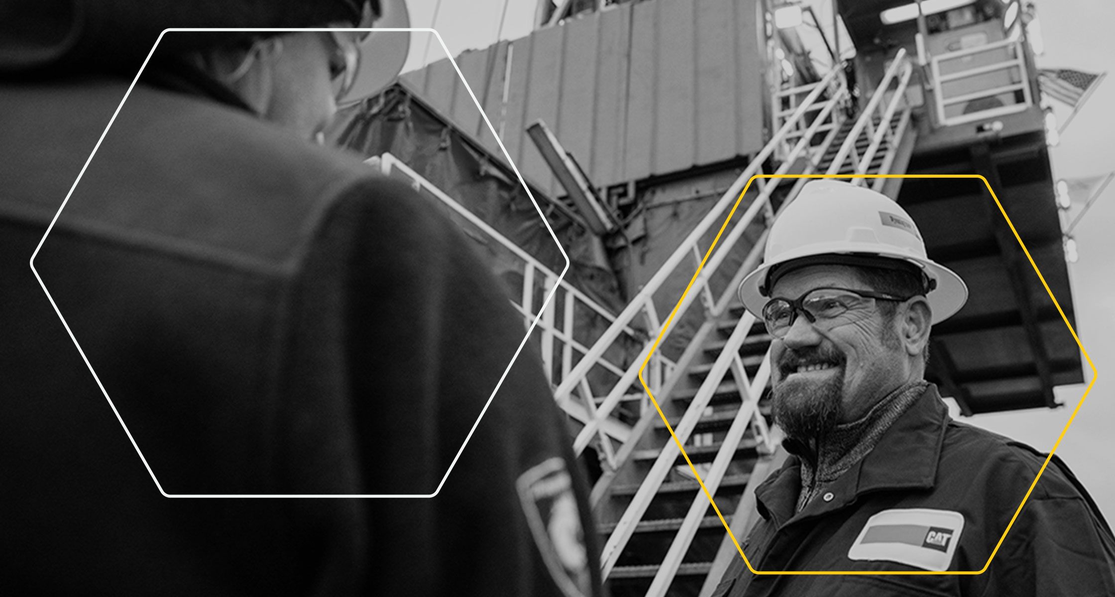 Black and white photo of Cat dealer smiling at a customer