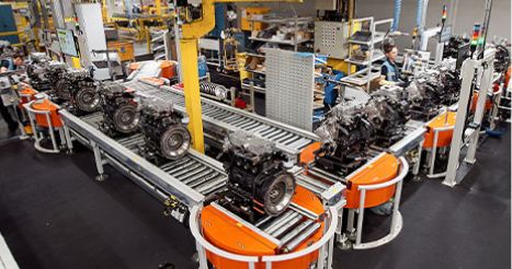 Engines moving along conveyor belts