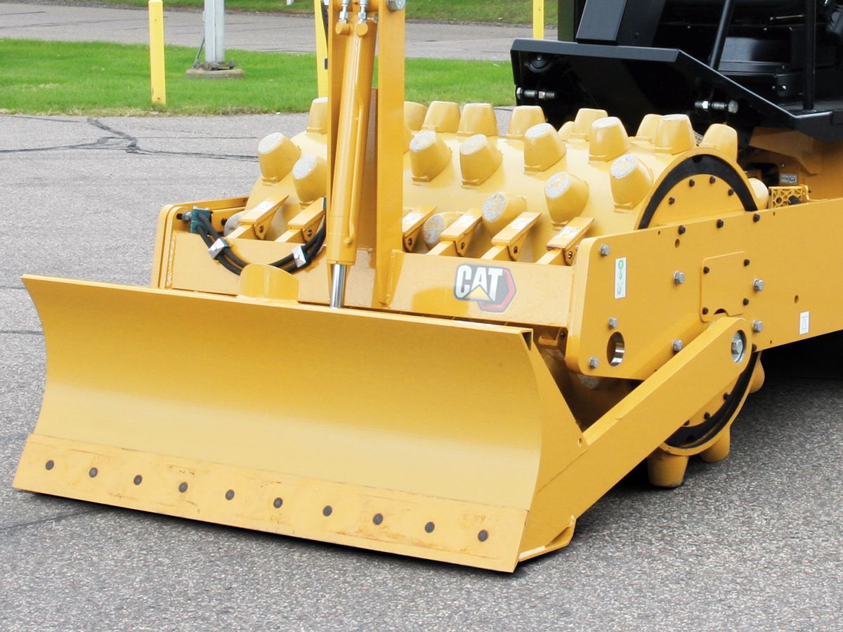 Vibratory drum on Cat CP5 vibratory soil compactors