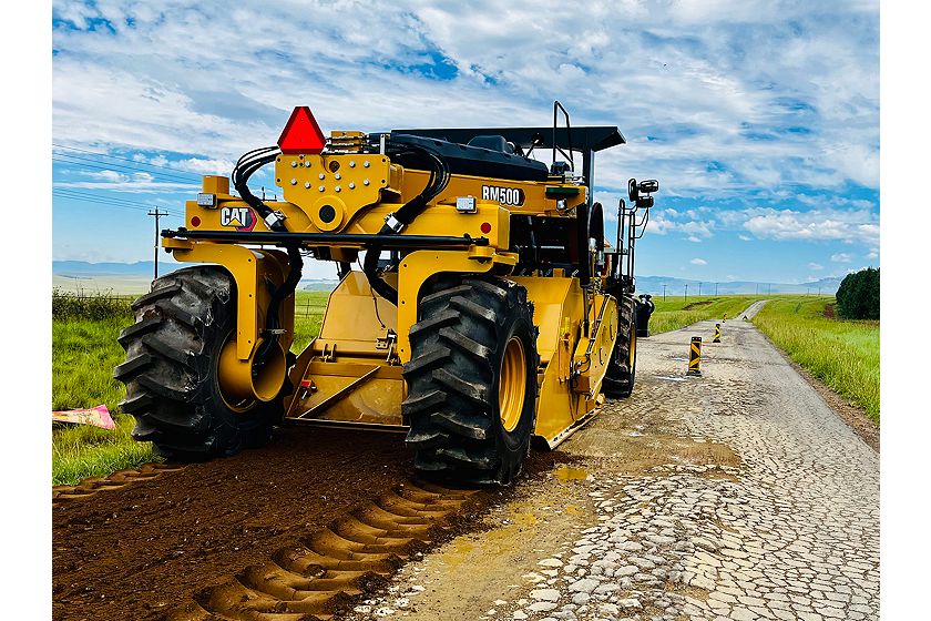 Cat RM500 road reclaimer/soil stabilizer reclaiming an asphalt road