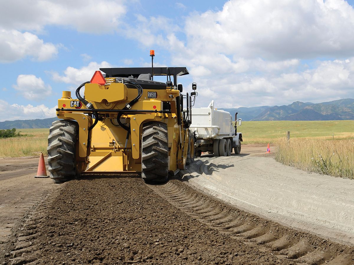 Cat RM500 road reclaimer/soil stabilizer reclaiming an asphalt road