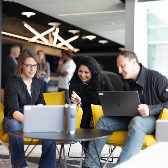 A group of employees have a meeting