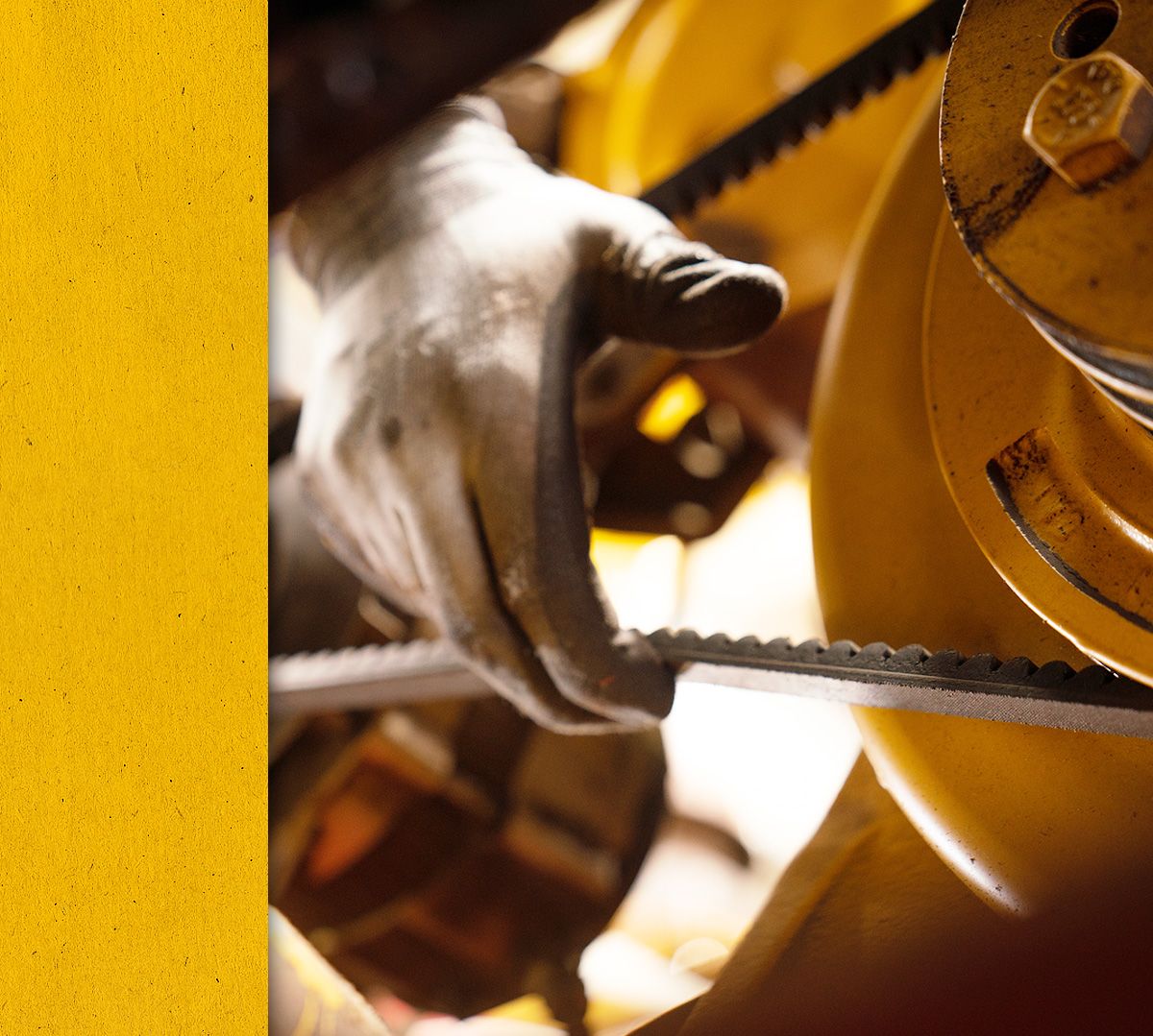 Close up of hand checking to make sure a Cat Engine part is working correctly