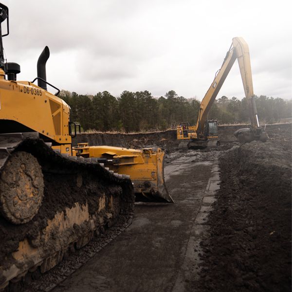 An excavator and a dozer on a jobsite