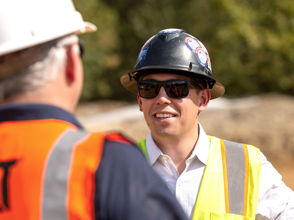 Man smiling while talking