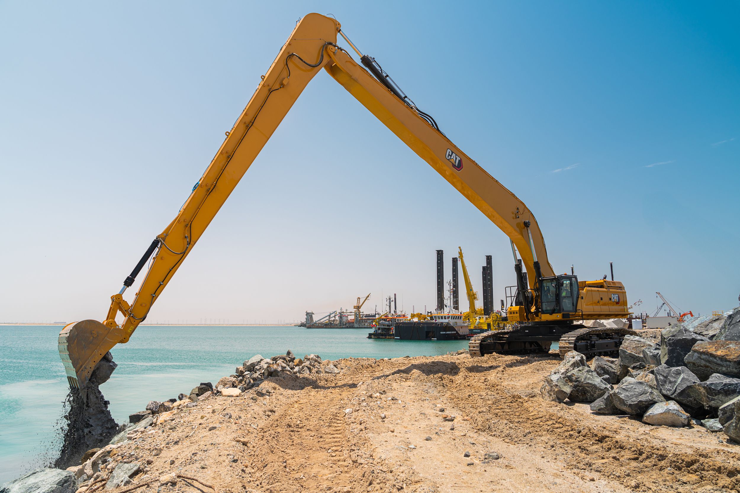 When your work is a little farther away, reach for Cat super long reach and long reach excavators. They are specialized machines designed to perform despite the unique challenges of working at distance.>