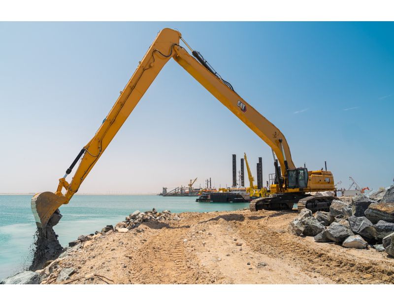 Cat® 395 LRE Hydraulic Excavator - When your work is a little farther away, reach for Cat super long reach and long reach excavators. They are specialized machines designed to perform despite the unique challenges of working at distance.