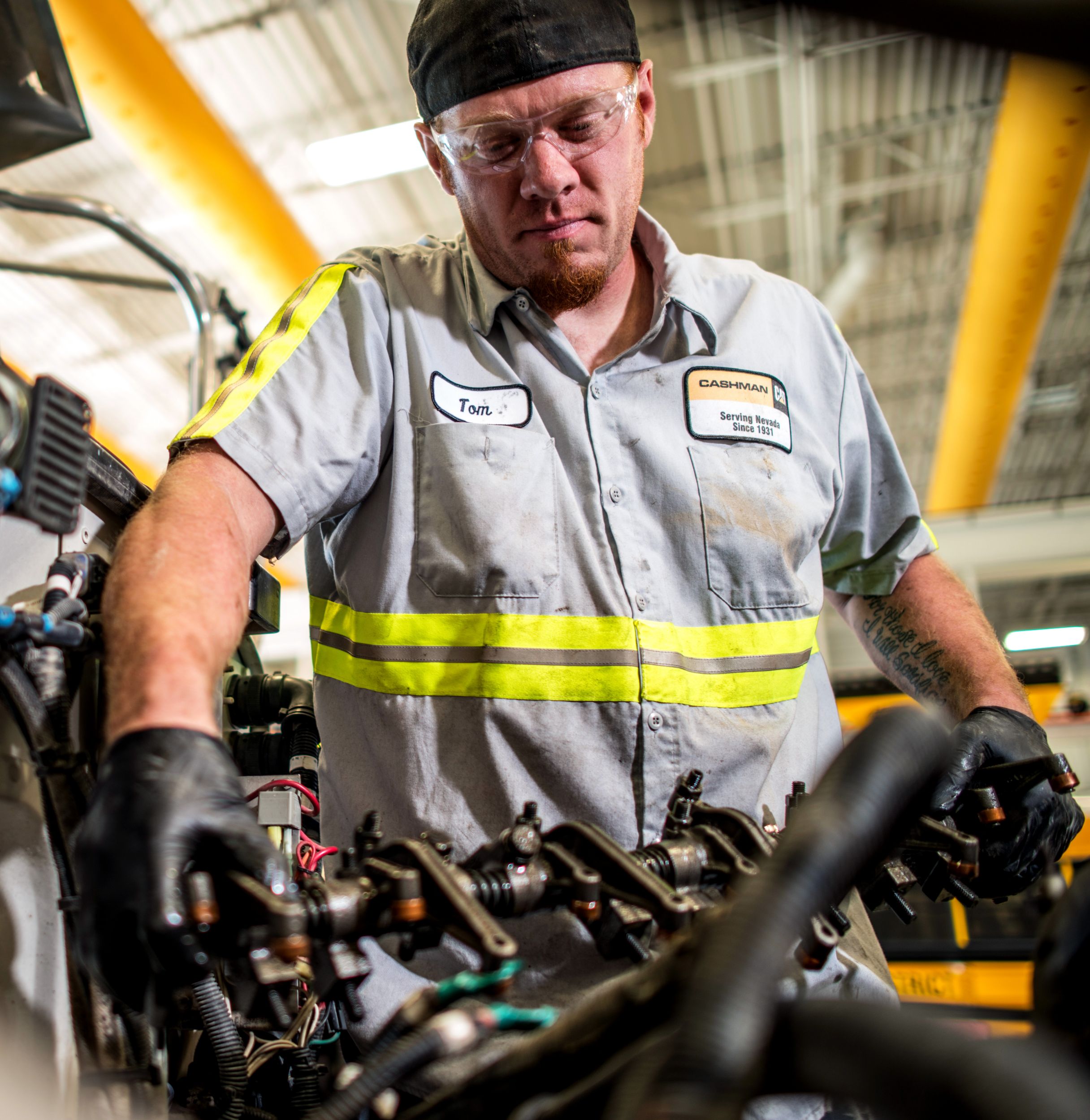 mechanic working on Corinth C15 engine tro