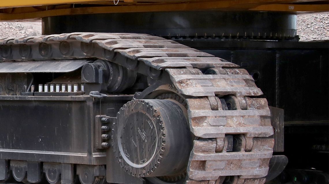 Material rodante com esteira lubrificada com graxa para escavadeiras hidráulicas de mineração