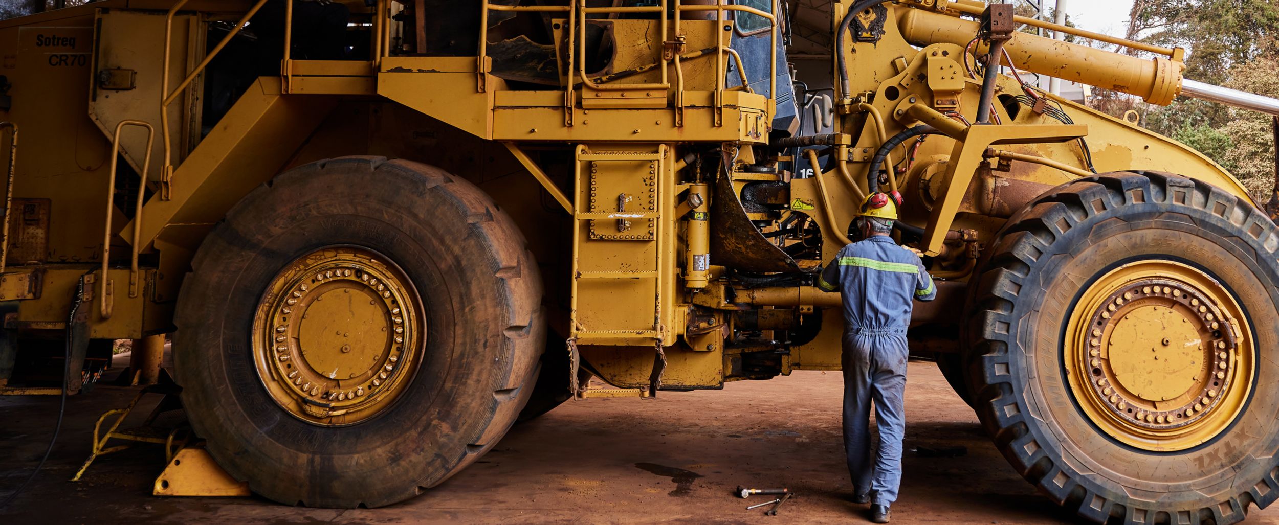Person standing near Cat Machine