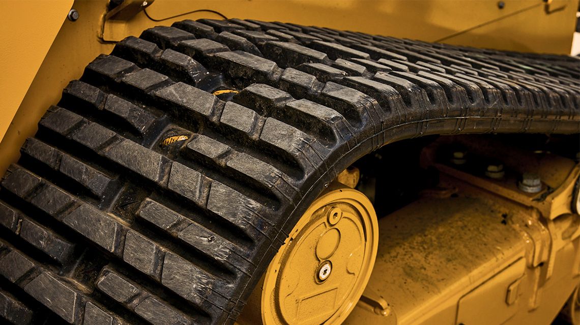 Material rodante com esteira de borracha