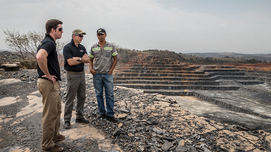 Three men at mining site