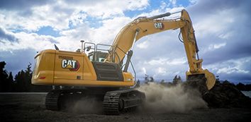 972 Wheel Loader dumping dirt on jobsite