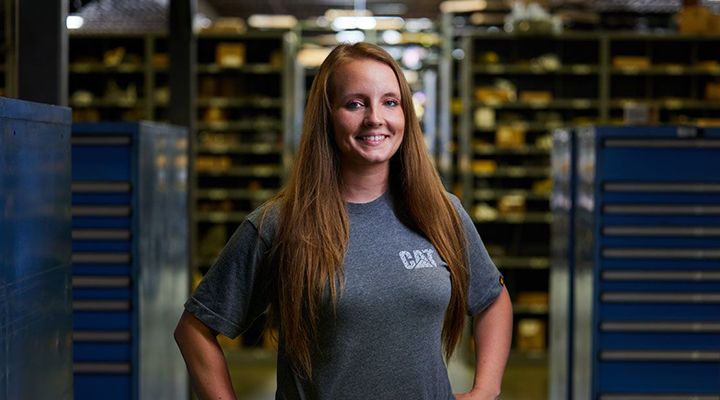 Cat Employee Smiling at Camera