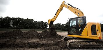 315GC Cat Excavator moving dirt on jobsite