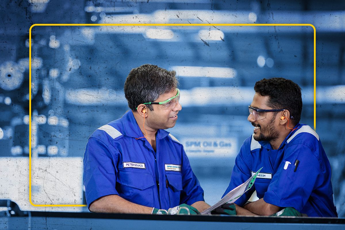 SPM employees having a conversation