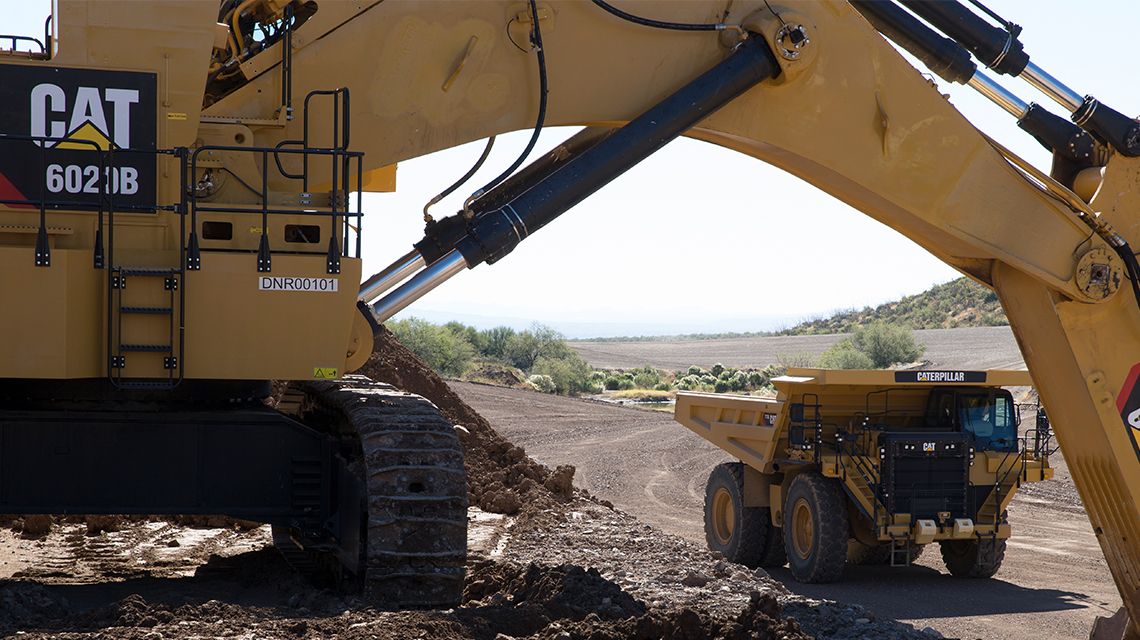 Excavtor and mining truck
