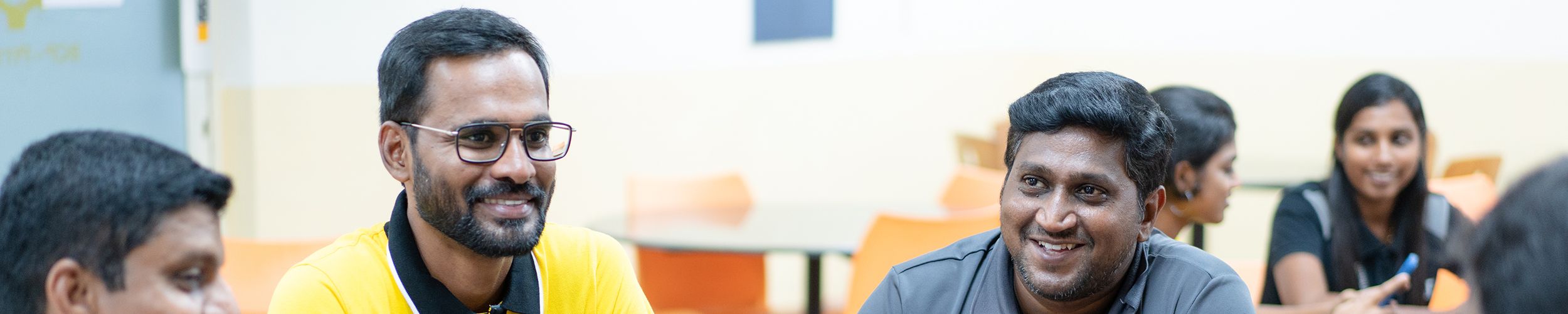 A group of employees talking