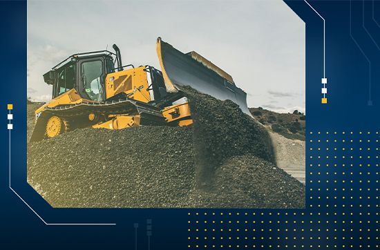 Dozer pushing dirt on a jobsite with blue banner