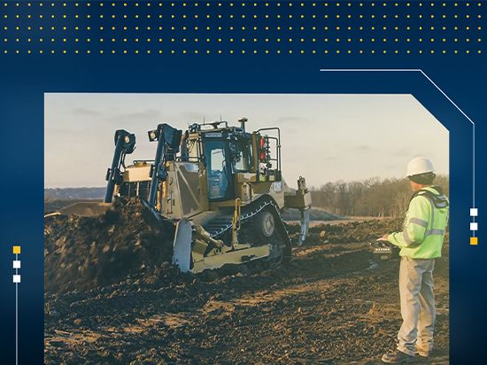 Dozer pushing dirt on a jobsite with blue banner