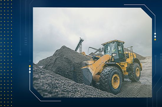 wheel loader picking up material