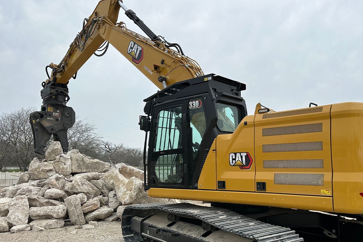 Cat 330 SB Excavator Crushing Rocks