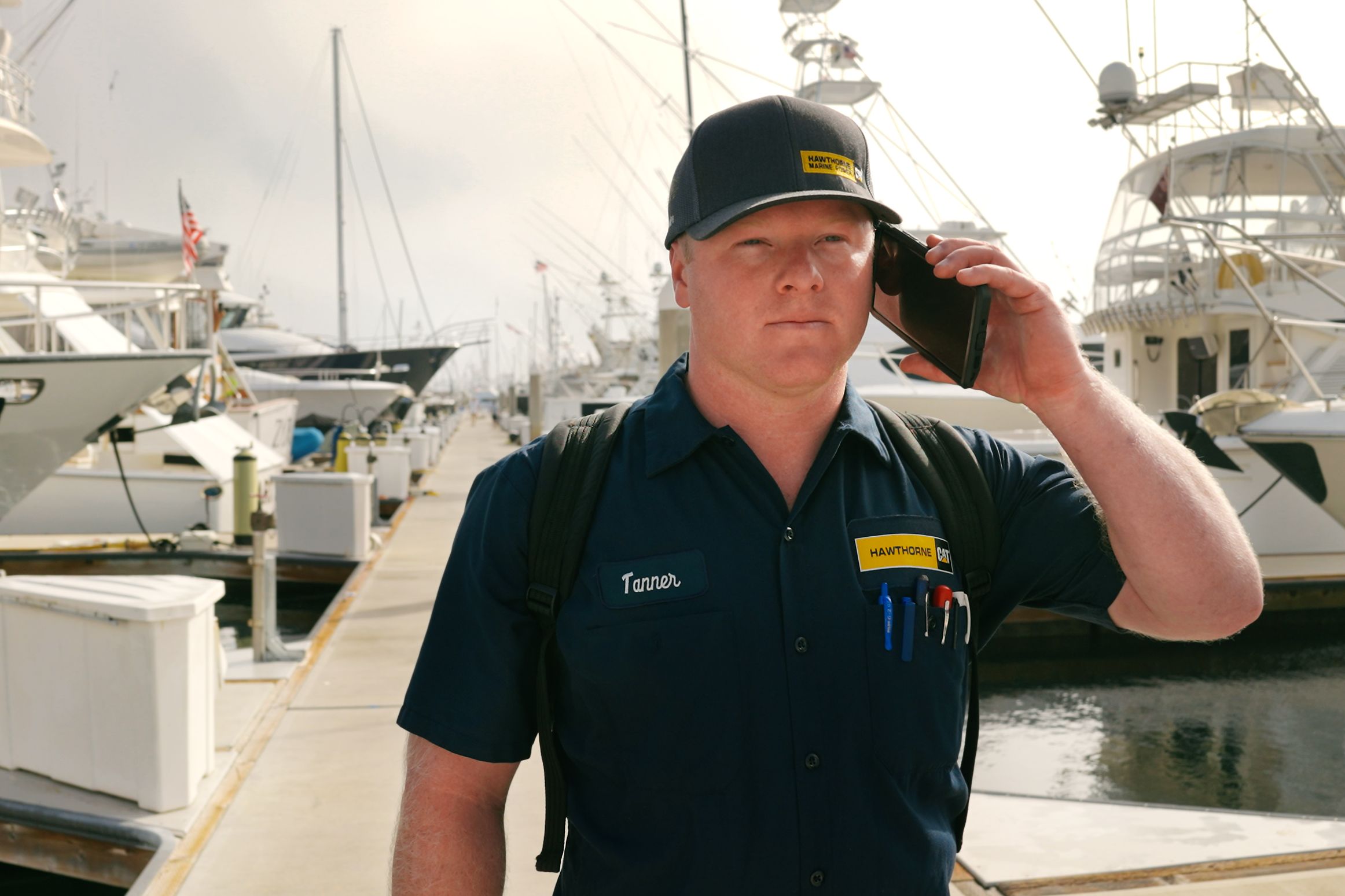 service rep on phone in marina