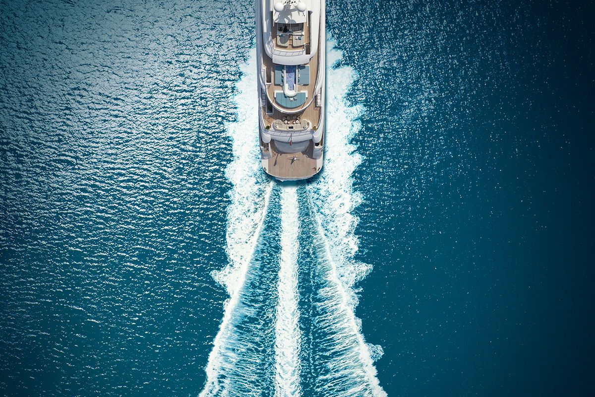 top down view of yacht and its wake