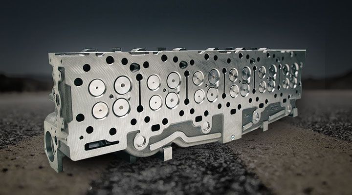 close-up of an engine with a REPAIR. OVERHAUL. REPOWER. SAVE. graphic