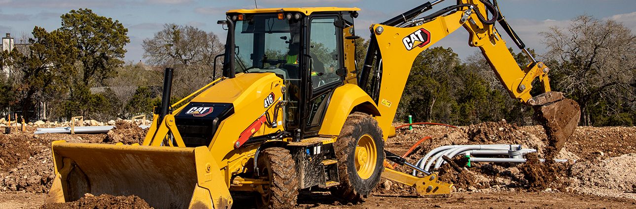 Retroescavadeira 416 em operação