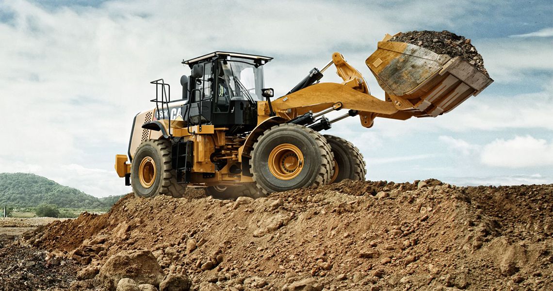 Wheel loader on a dirt pile 