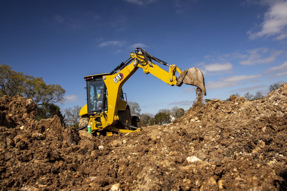 Configurar sua retroescavadeira Cat ® 416 ou 420 com a transmissão Powershift