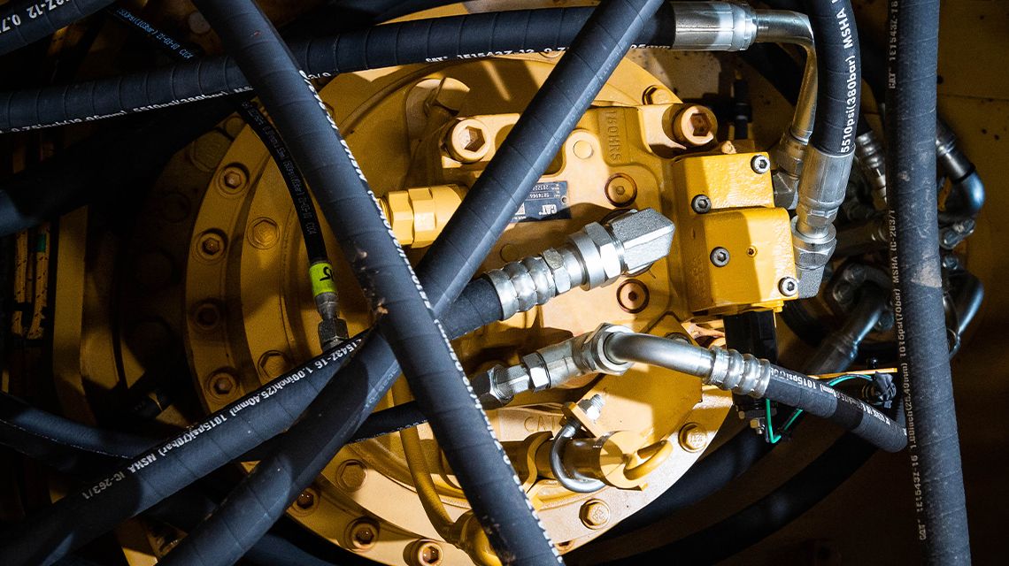 Water Pump surrounded by Hoses