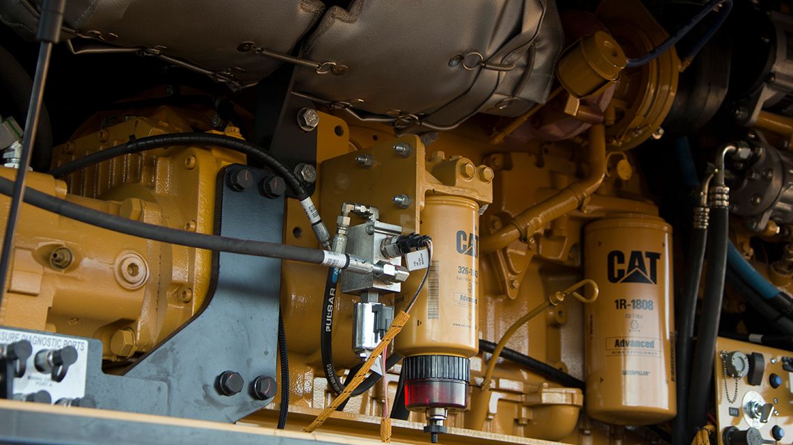 Valves hoses and filters inside of cat engine bay