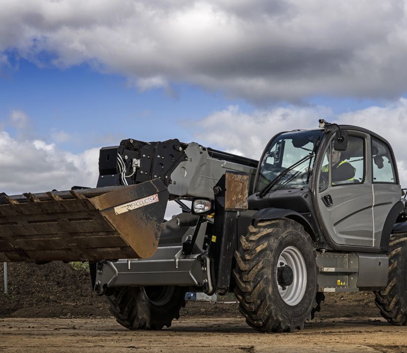 Man standing with a hybrid powered machine