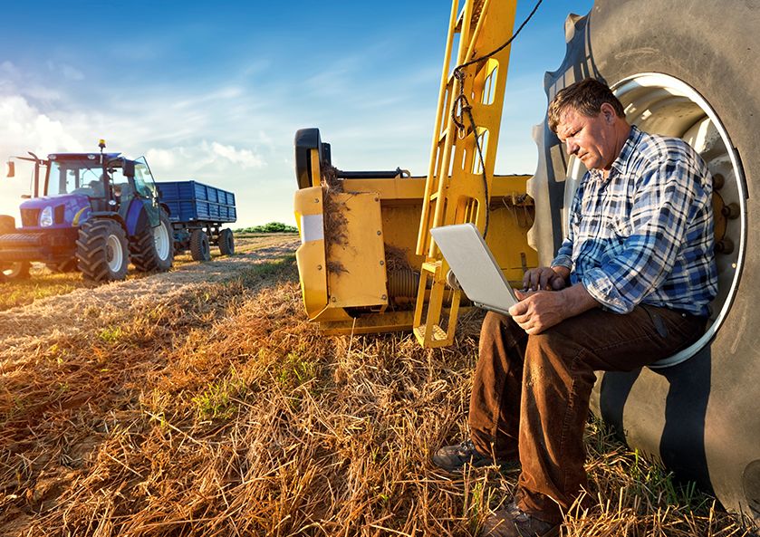 Man using computer at jobsite